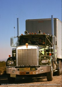 The Big Green Truck rolls toward camera