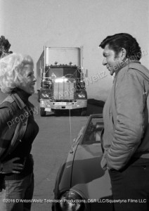 Claude Akins and Janet Leigh flirt
