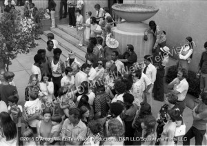 Claude Akins signs autographs for a crowd of fans