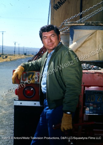 Claude Akins at the back of his trailer