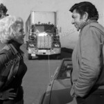 Claude Akins and Janet Leigh flirt