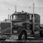 Sonny Pruitt and Will Chandler pull up in the Kenworth