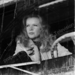 Anne Francis behind the windshield