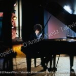 John Rubinstein plays piano