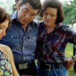 Claude Akins and Patricia Neal study the script