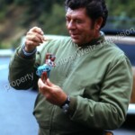 Claude Akins with mirror ornament