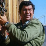 Claude Akins checks the load